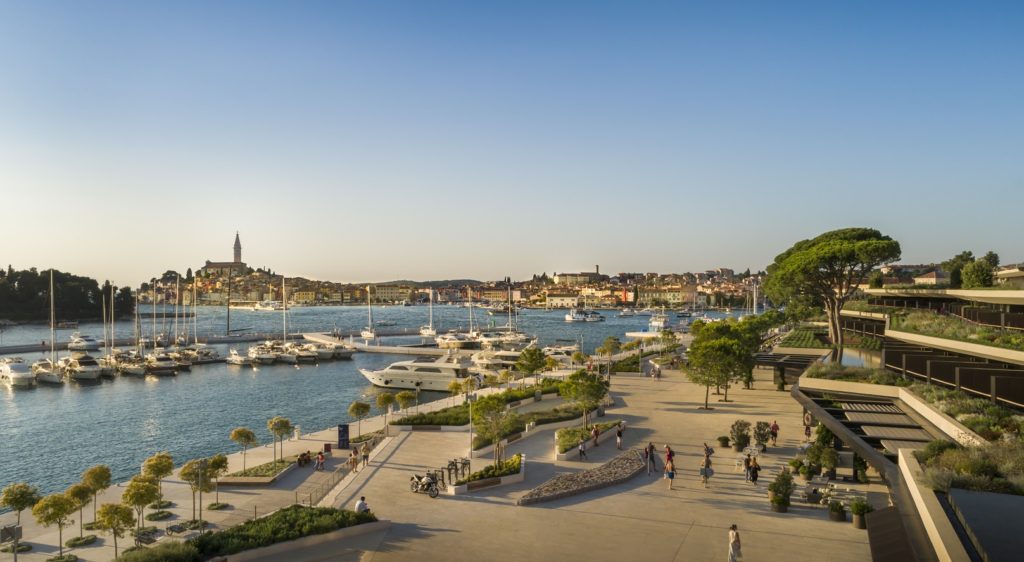 Waterfront promenade in front of Grand Park Hotel with view of Rovinj.