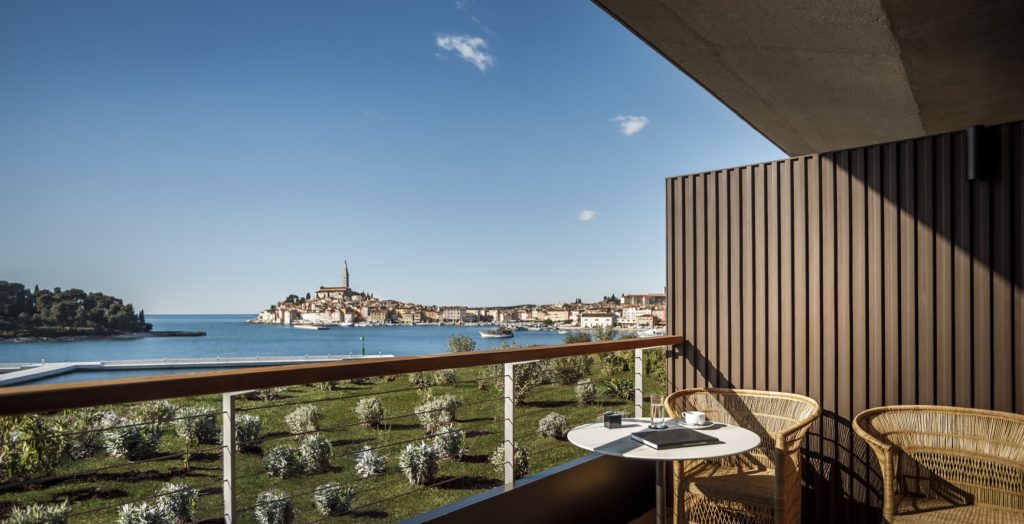 Bright blue sky and view of Rovinj from a private patio room at the Grand Park Rovinj.