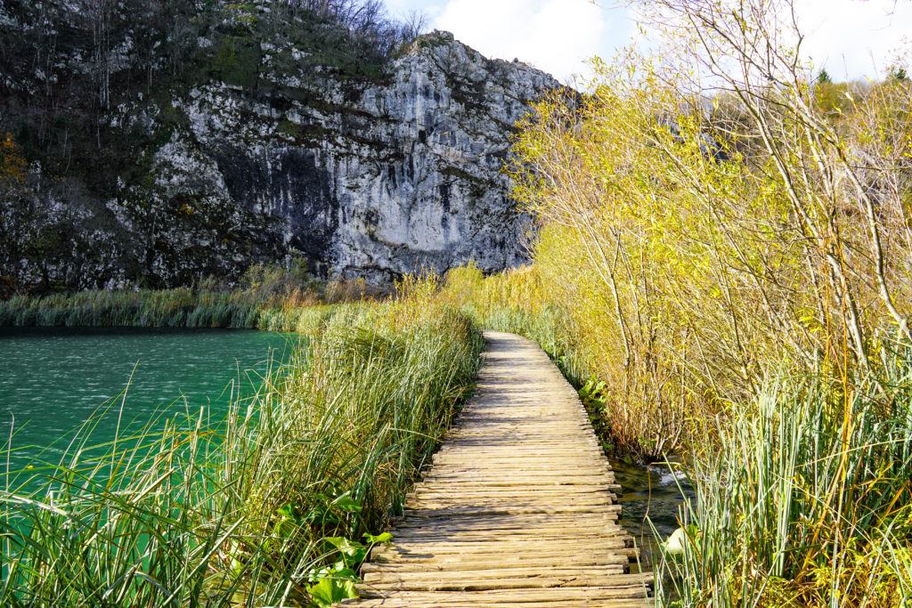 At Plitvice Lakes National Park, a series of wooden footbridges and pathways snake over the lakes and around their shores providing gentle trails for visitors to wander, explore, and take in the breathtaking views