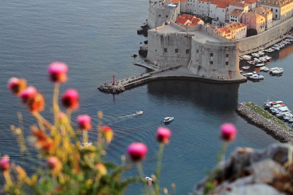 A bird's eye view of boats entering Dubrovnik's Old Port